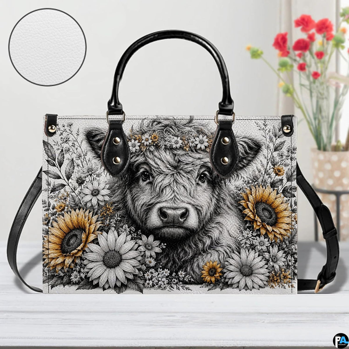 Studio front display of floral sketch Highland cow design with inset detail view