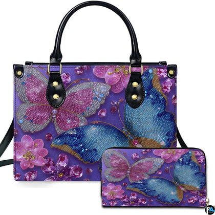Jeweled crystal butterfly handbag and matching wallet set on white backdrop