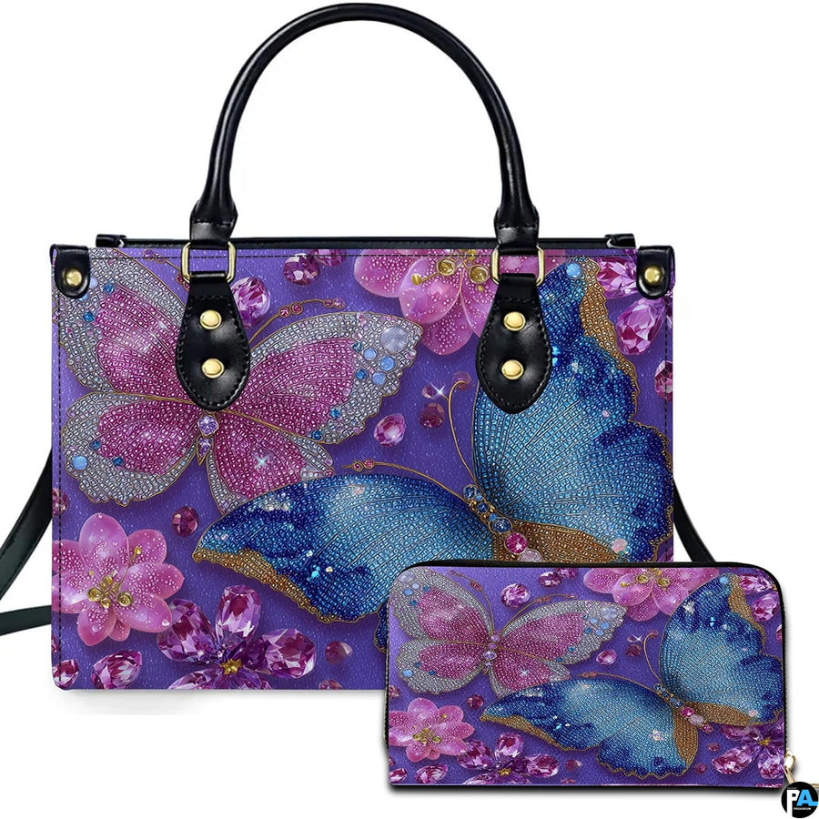 Jeweled crystal butterfly handbag and matching wallet set on white backdrop