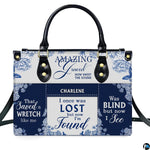Close-up detail of blue floral damask toile pattern and serif hymn lettering