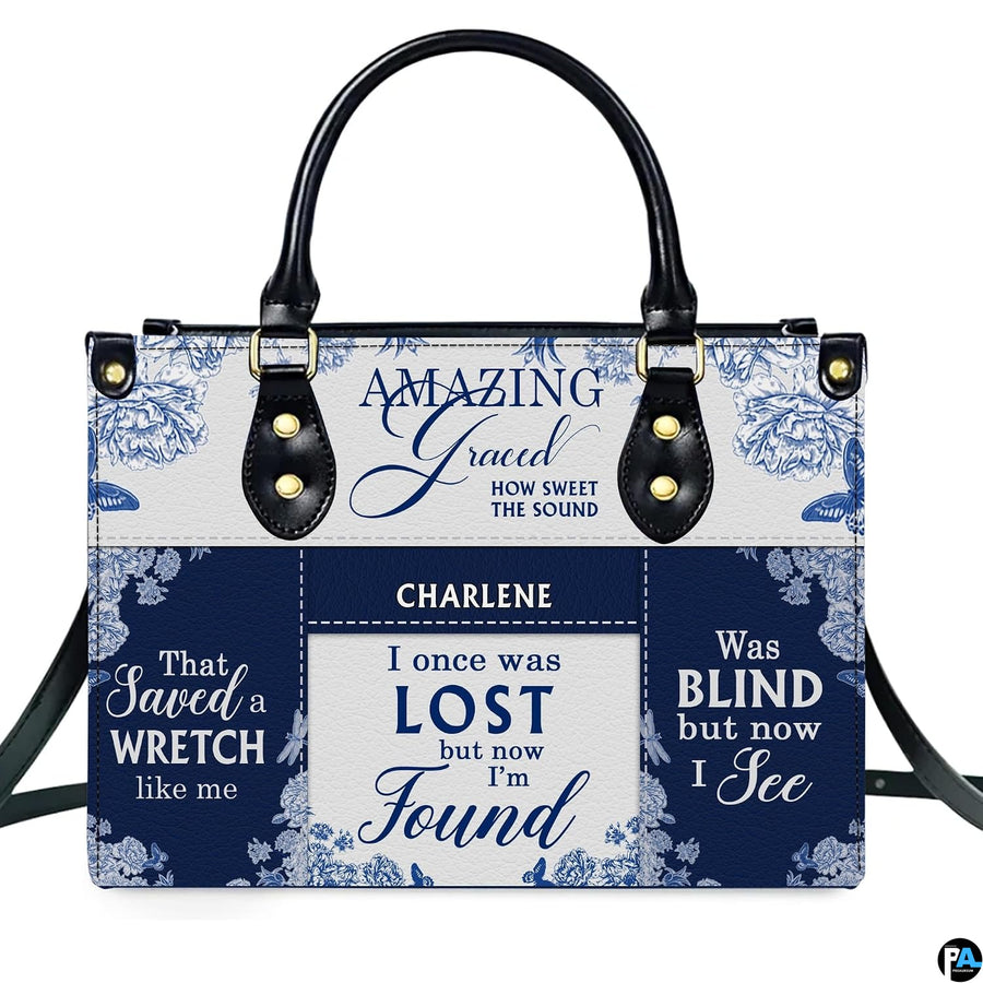 Close-up detail of blue floral damask toile pattern and serif hymn lettering