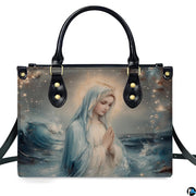 Front isolated view of Stella Maris handbag featuring Virgin Mary and starry waves.