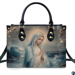 Front isolated view of Stella Maris handbag featuring Virgin Mary and starry waves.