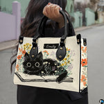 Coordinating literary black kitten tote handbag and zippered wallet duo