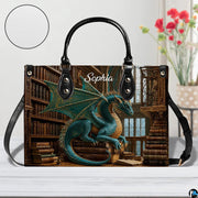 Top-down view of guardian dragon handbag showing full-length zipper closure opening