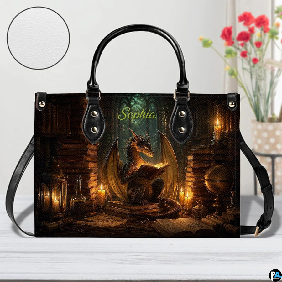 Top-down view of candlelit dragon handbag showing full-length zipper closure opening