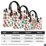 Side perspective view of pastel paw print handbag and wallet showing structured profile