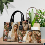 Virgin Mary floral devotional handbag and companion wallet on wooden display surface