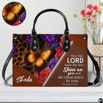 Interior compartment view displaying lining and organizational pockets of leopard floral handbag.
