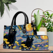 Black cat van gogh starry night design resting beside potted greenery on a tabletop.