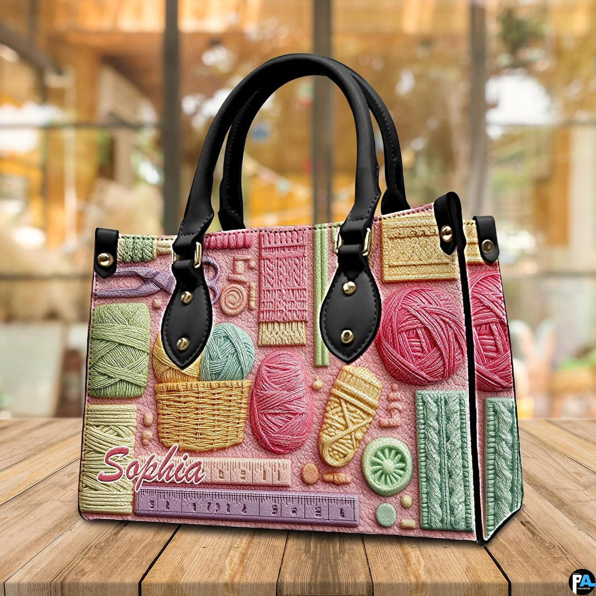 Side profile view of needlecraft art illustrating depth and dark top elements.