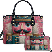 Front view of whimsical Nutcracker soldier artwork in teal and gold against a lively pink background