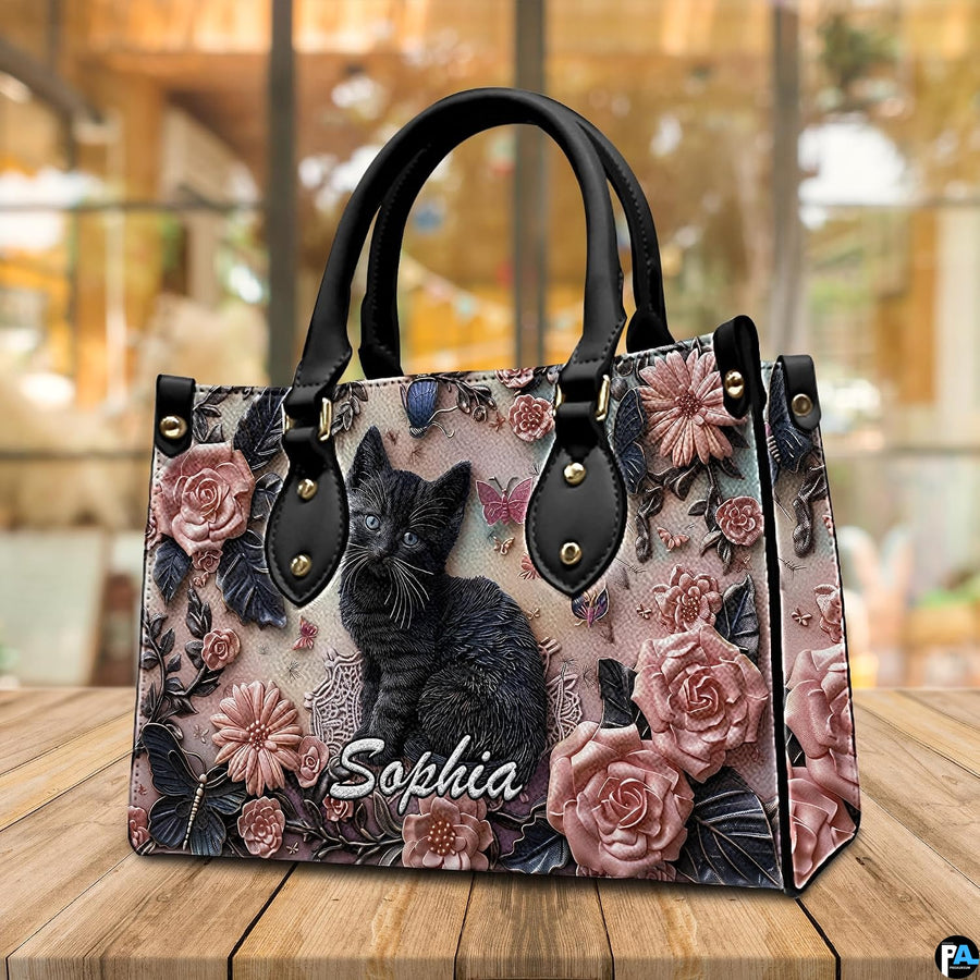 Alternative angle display of black kitten rose relief handbag and wallet set