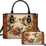 Handbag and matching wallet set featuring three hummingbirds and ornate carved scrollwork borders.