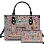 Pastel sewing machine sculpture art presented beside matching companion accessory on neutral surface.