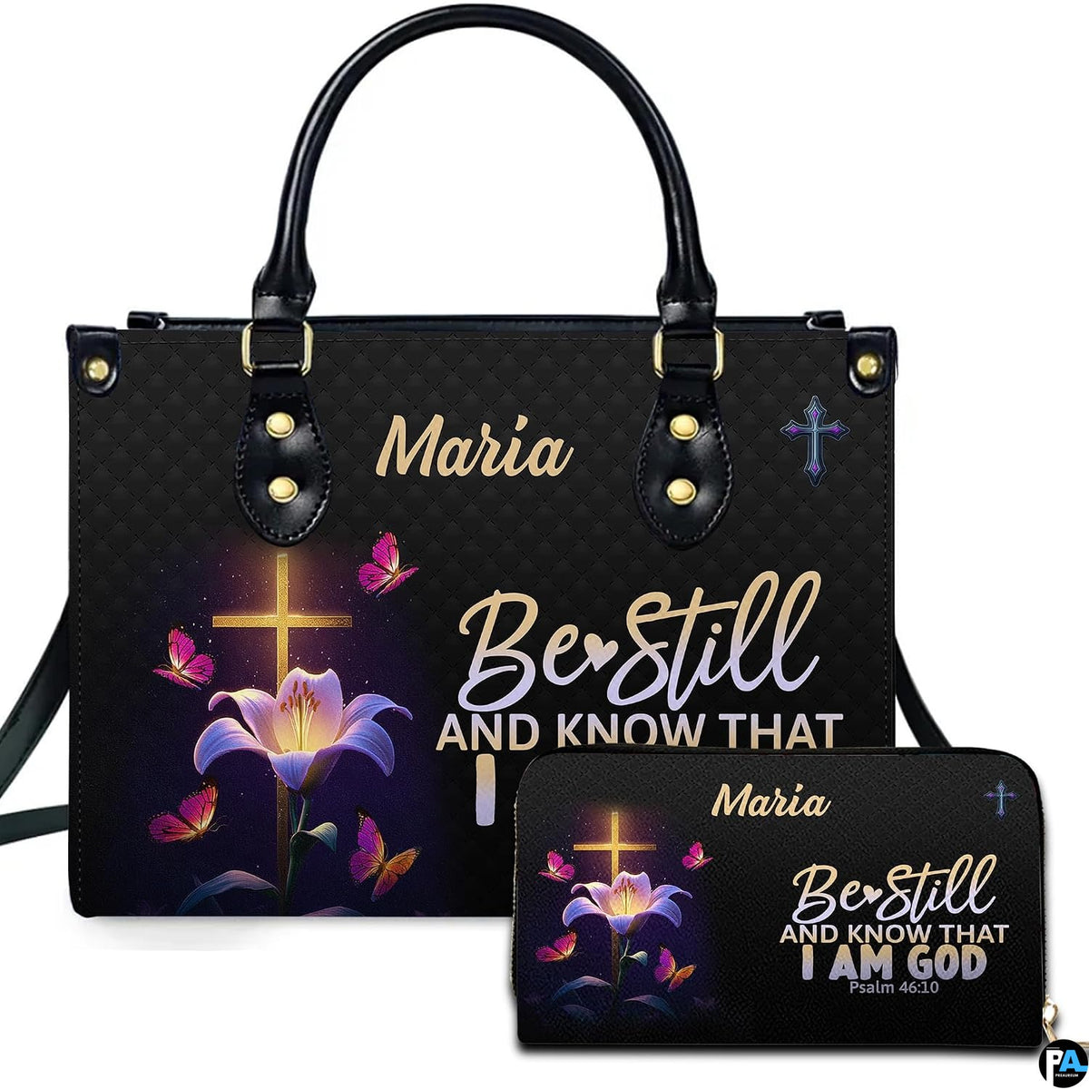 Front view of illuminated cross handbag and matching wallet featuring a blooming lily and radiant butterflies.