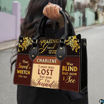 Model carrying Christian hymn patchwork handbag along city street