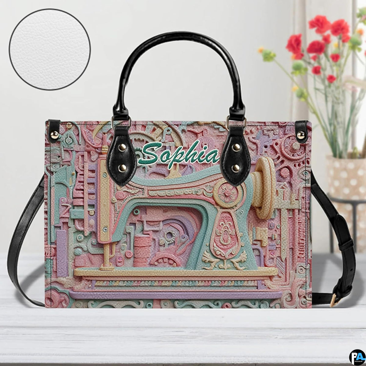 Front studio view highlighting pastel sewing machine sculpture relief and circular textured inset disc.