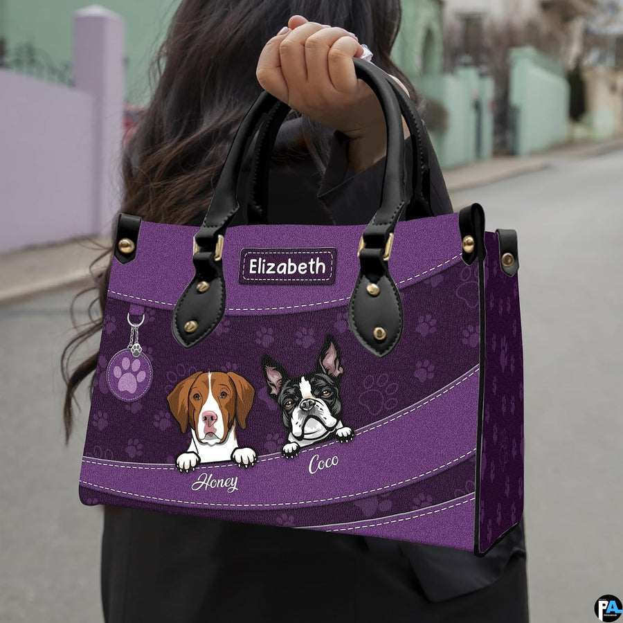 Side profile perspective of purple pet handbag showing structured shape and proportions.
