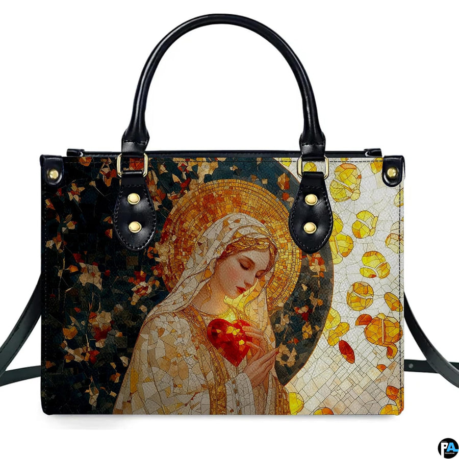 Front studio shot of stained glass mosaic Virgin Mary handbag on white backdrop.