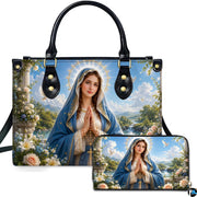 Pastoral Virgin Mary handbag and matching wallet set on marble terrace with landscape