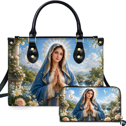 Pastoral Virgin Mary handbag and matching wallet set on marble terrace with landscape