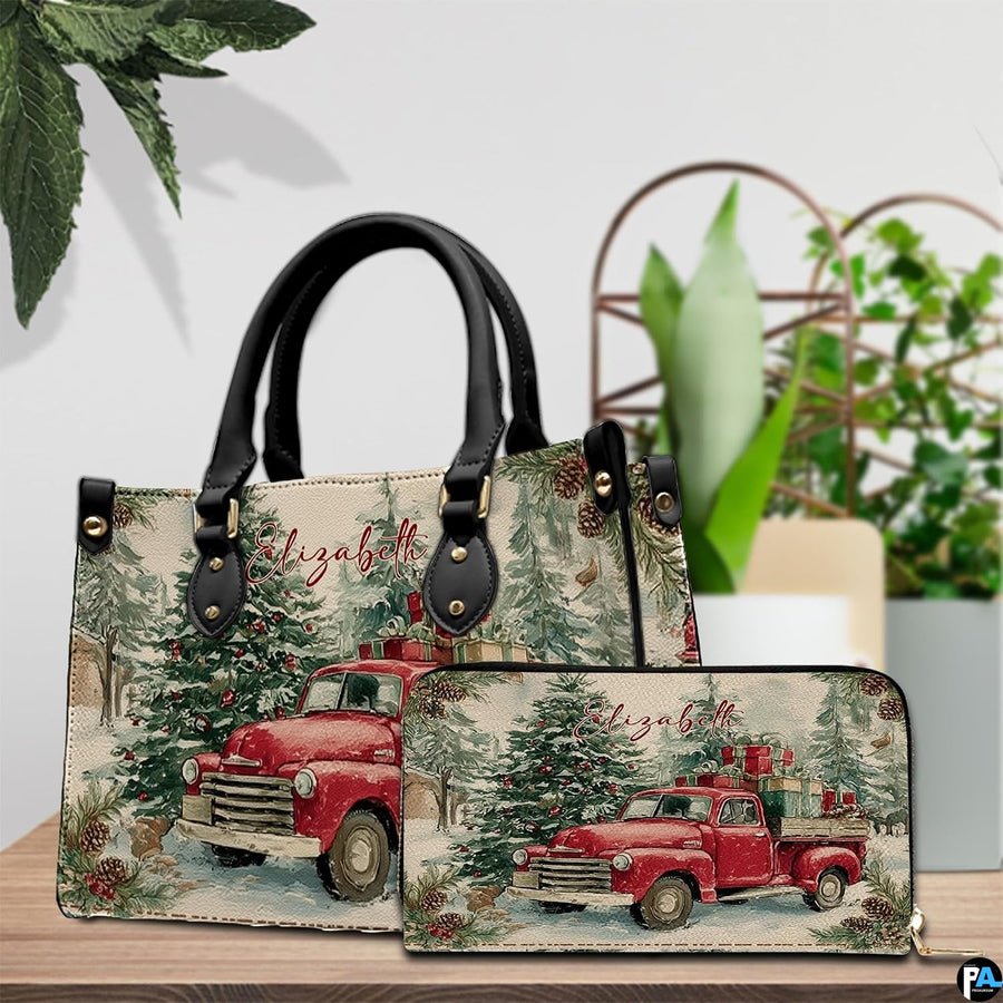 Angled view showing detailed vintage red holiday truck artwork on handbag