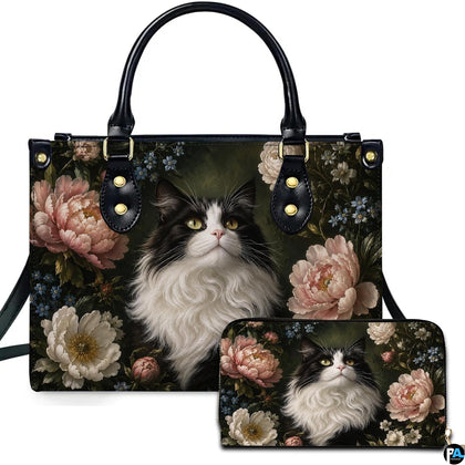Studio presentation showing fluffy tuxedo cat artwork alongside matching companion accessory on white surface.