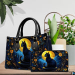 Indoor scene presenting gothic black cat artwork and companion accessory beside potted plants.