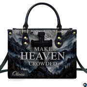 Detailed view of matching mountain peak stone cross zippered wallet