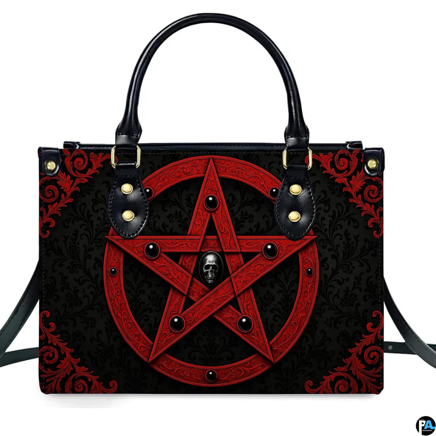 Gothic inverted crimson pentagram skull handbag shown alone on white background.