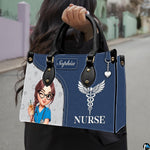 Chibi winking nurse handbag carried outdoors showing visual scale against street setting.
