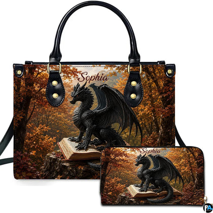 Front presentation showing a black horned dragon perched on an open antique book in an autumn woodland