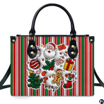 Front view of holiday handbag featuring red and green stripes with Santa Claus and gingerbread artwork.