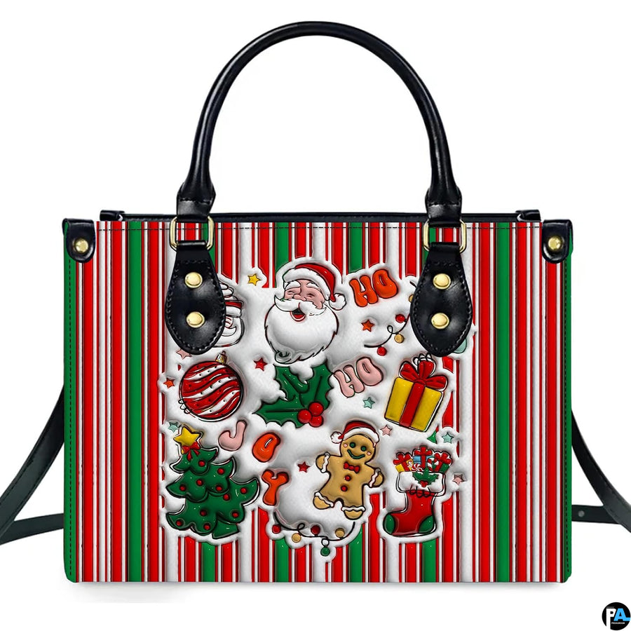 Front view of holiday handbag featuring red and green stripes with Santa Claus and gingerbread artwork.