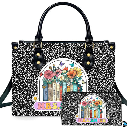 Composition notebook art accessory displaying marbled pattern and floral book arch badge alongside companion item.