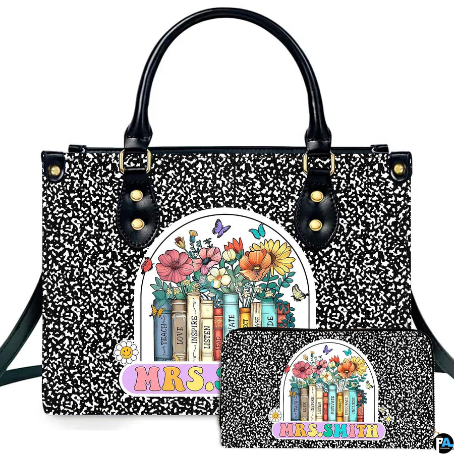 Composition notebook art accessory displaying marbled pattern and floral book arch badge alongside companion item.