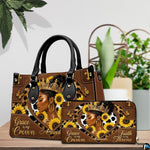 Coordinated indoor arrangement displaying queen sunflower artwork and companion accessory beside greenery.