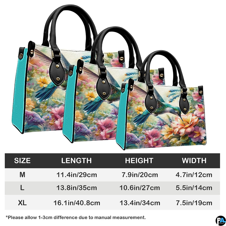 Detailed view of watercolor wildflower brushwork and pastel floral tones across handbag.