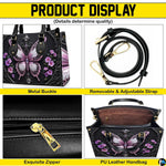 Bottom view of gothic butterfly handbag showing protective metal feet studs and smooth base wrap