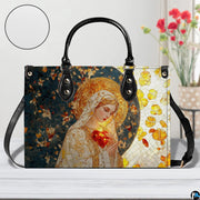 Front view of stained glass Virgin Mary handbag in studio staging with floral background.