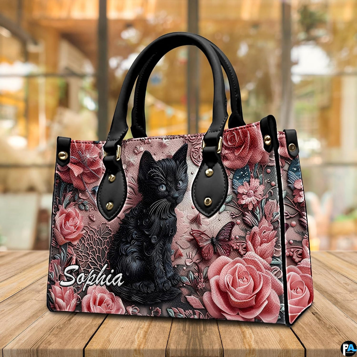 Visual demonstration of decorative black cat floral artwork.