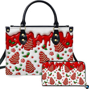 Holiday handbag and matching wallet featuring red drip glaze, gingerbread trees, and peppermint candy swirls.