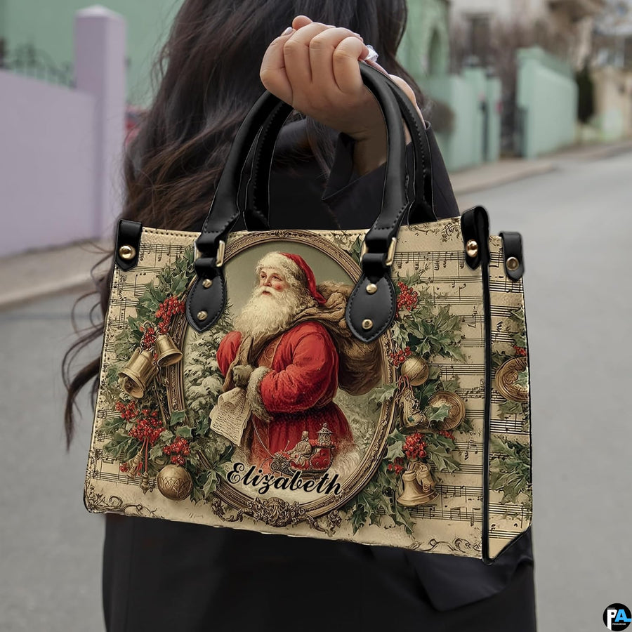 Matching wallet displaying Victorian Santa Claus and Christmas sheet music design