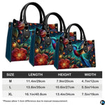 Complete set presentation of luminous hummingbird handbag and matching wallet on neutral backdrop.
