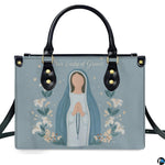 Front view of minimalist praying Virgin Mary watercolor handbag on white background