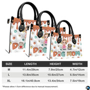Complete set presentation of 3D cartoon dog lover handbag and wallet set on white backdrop.