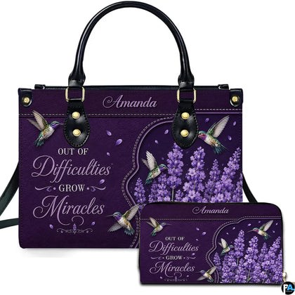 Purple hummingbird and lavender handbag and matching wallet set on violet texture