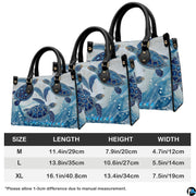 Coordinated arrangement of handbag and wallet showcasing the swimming sea turtle theme.