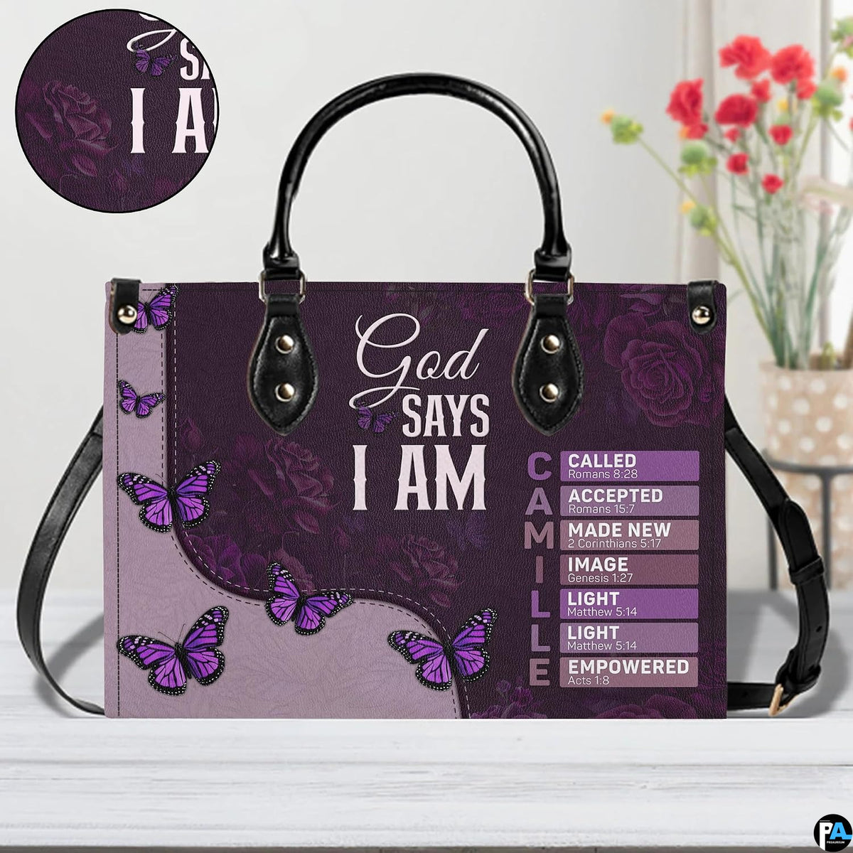 Front perspective of matching purple wallet displaying botanical butterflies and devotional quotes.